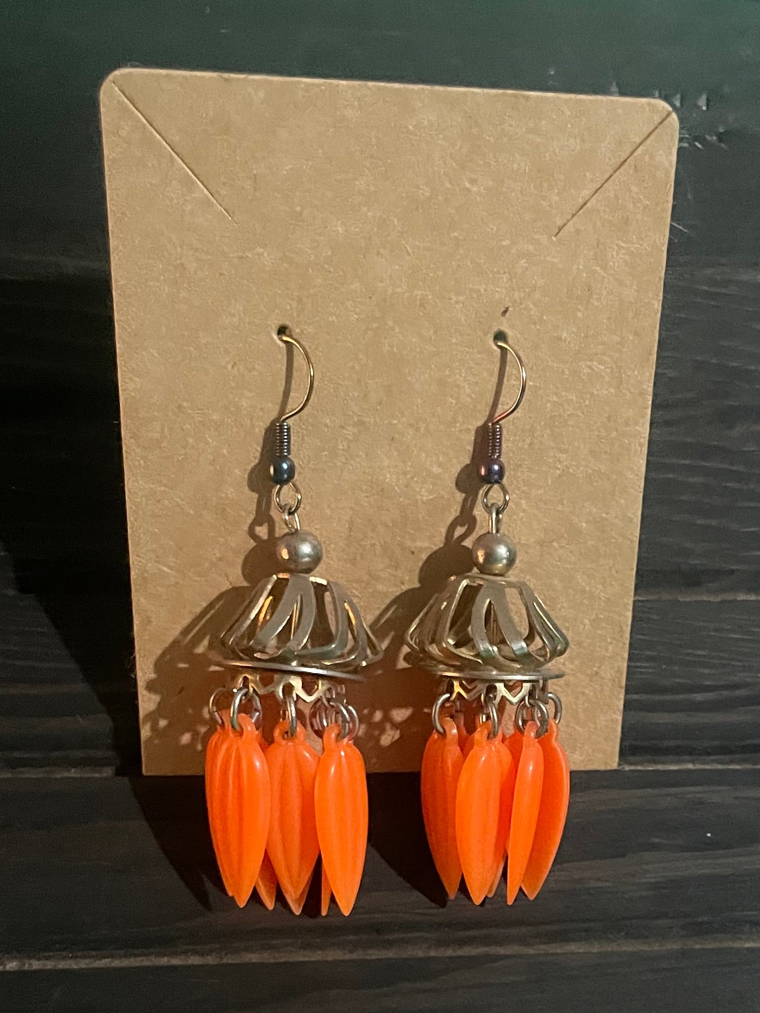 Orange pedal ear rings